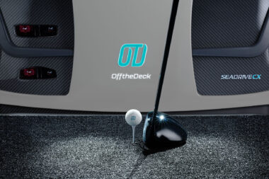 Close up studio photography of OfftheDeck Seadrive CX unit with a golf ball and club in London.