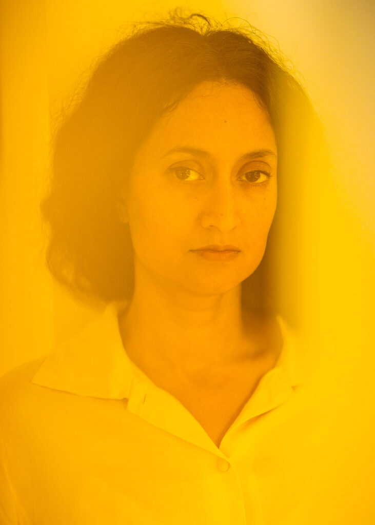 A colourful portrait of the artist Rana Begum in her home in London. Photo by Richard Boll.