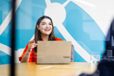 A woman in a meeting photographed by Richard Boll for Park Avenue Recruitment.