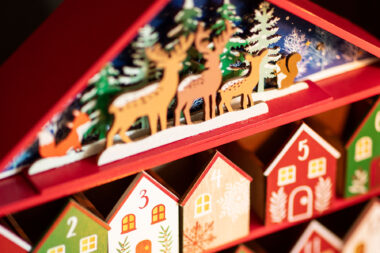 A detail photograph of a wooden advent calendar.