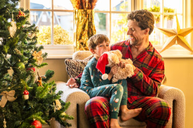 Lifestyle photography of a father and son at Christmas.